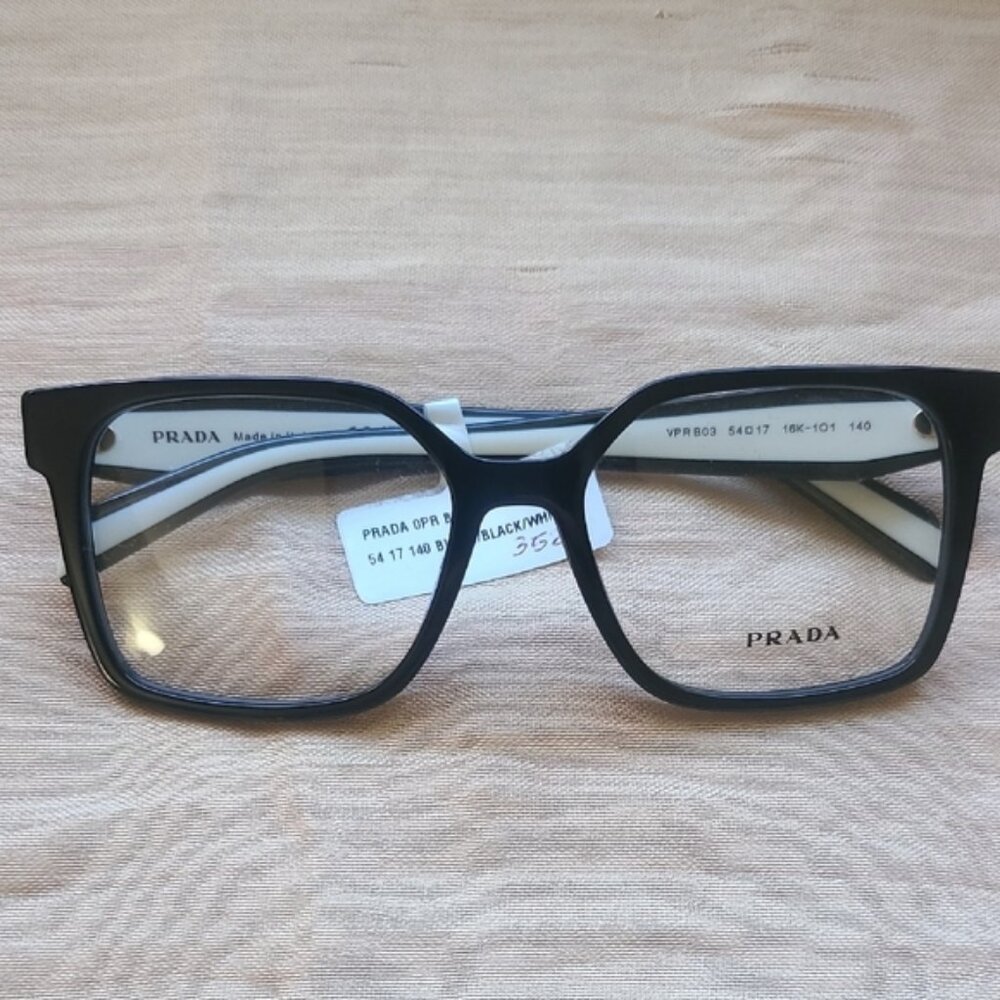 NEW & AUTHENTIC EYEGLASSES PRADA VPR803 SIZE 54-17-140, COLOR BLACK-WHITE